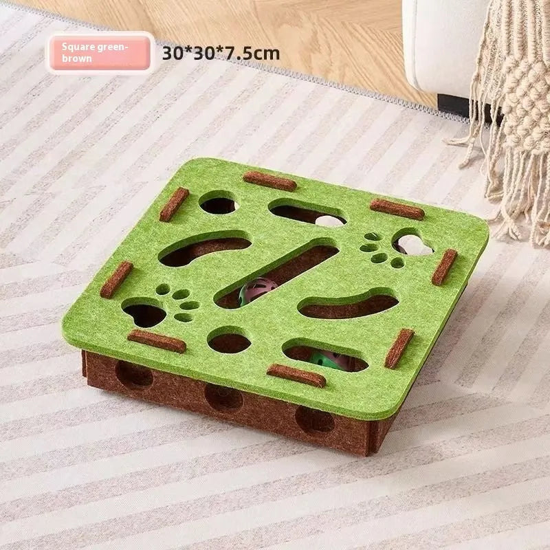 Green brown felt cat scratching toy box measuring 30 cm square.