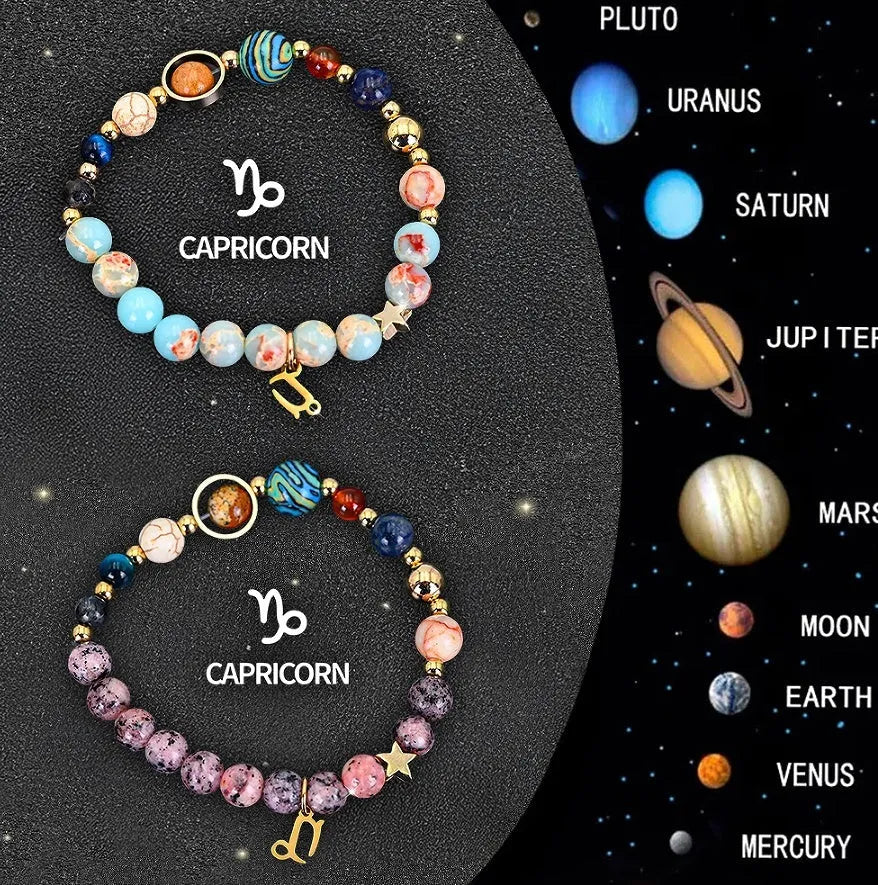 Two adjustable natural stone beaded bracelets with silver zodiac charms on a flat surface.