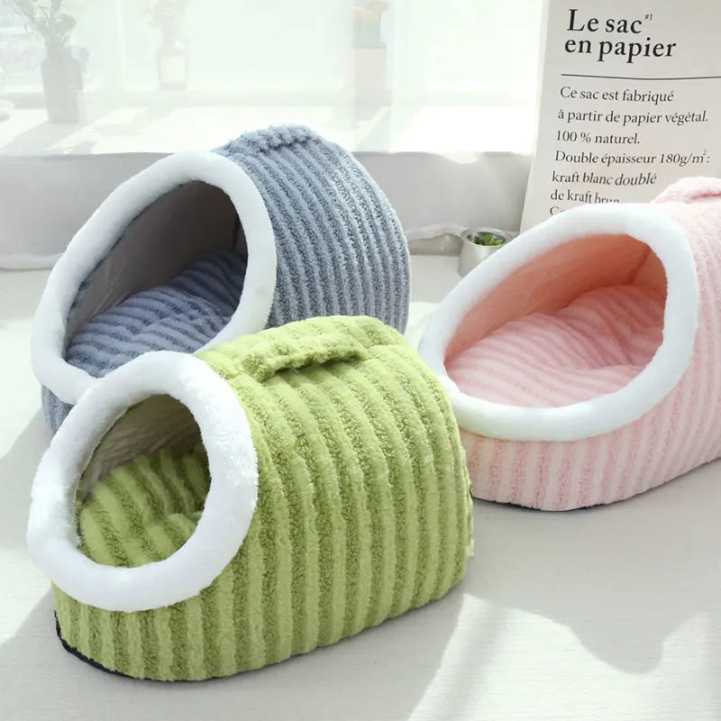 Macaron-shaped cat bed in blue colour, showing three-dimensional design with cloth material