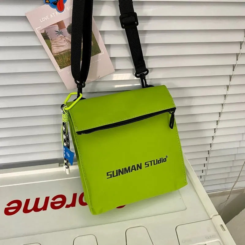 Simple all-match messenger bag backpack in polyester with adjustable crossbody strap, showing sewing line detail