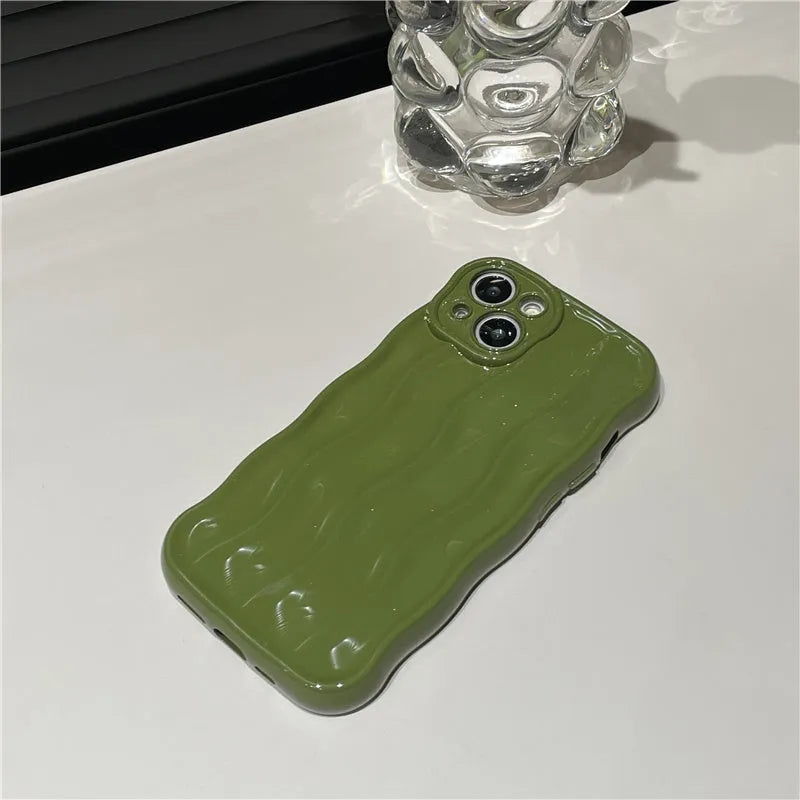 Silicone iPhone 17 case with water ripple pattern in green colour showing front and back views