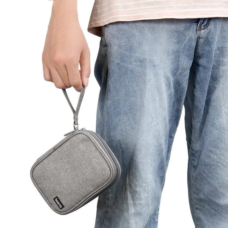 A grey and a black Oxford cloth protective case for a 2.5-inch mobile hard disk.