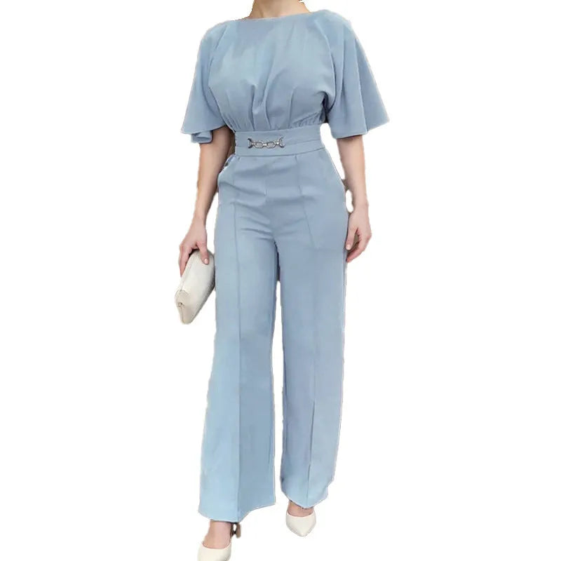 Blue men's casual polyester suit with long sleeve jacket and trousers on a hanger