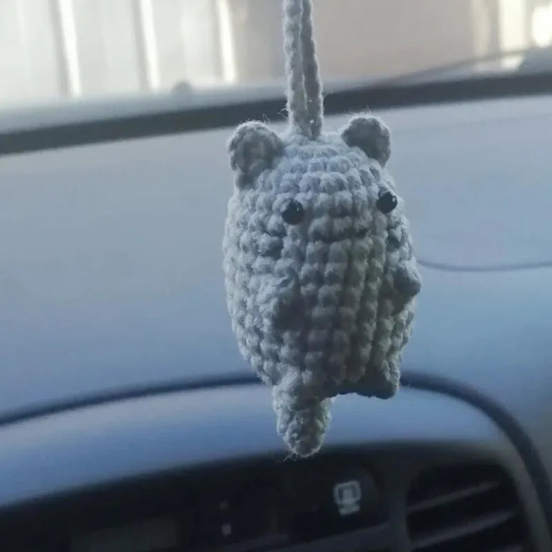 Plush hand-woven car hanging ornament in a cartoon design, made from soft polyester fabric.