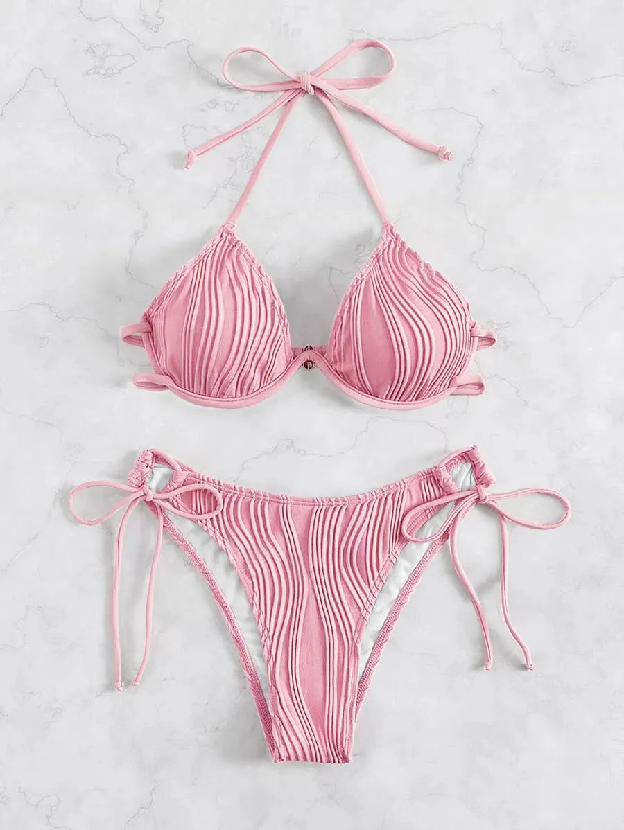 Women's apricot coloured bikini set with underwire cups and adjustable ties.