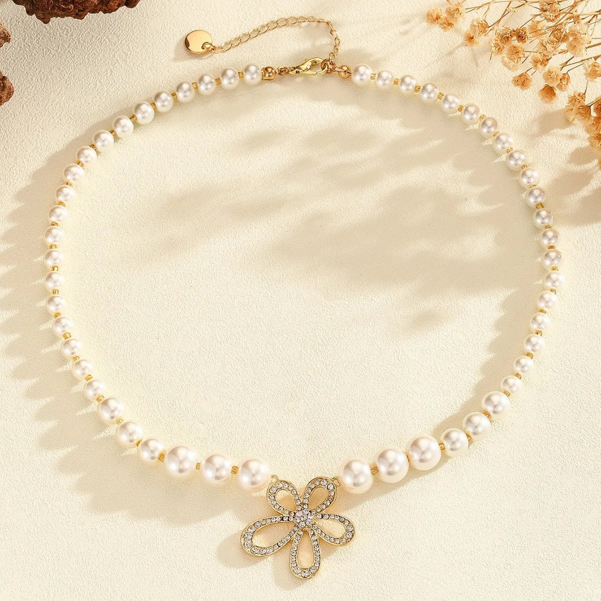 French romantic flower pendant necklace in silver tone with adjustable chain on white background