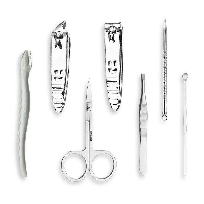 Pink 15-piece stainless steel manicure tool set in compact case measuring 15.5 by 8.2 by 1.3 cm