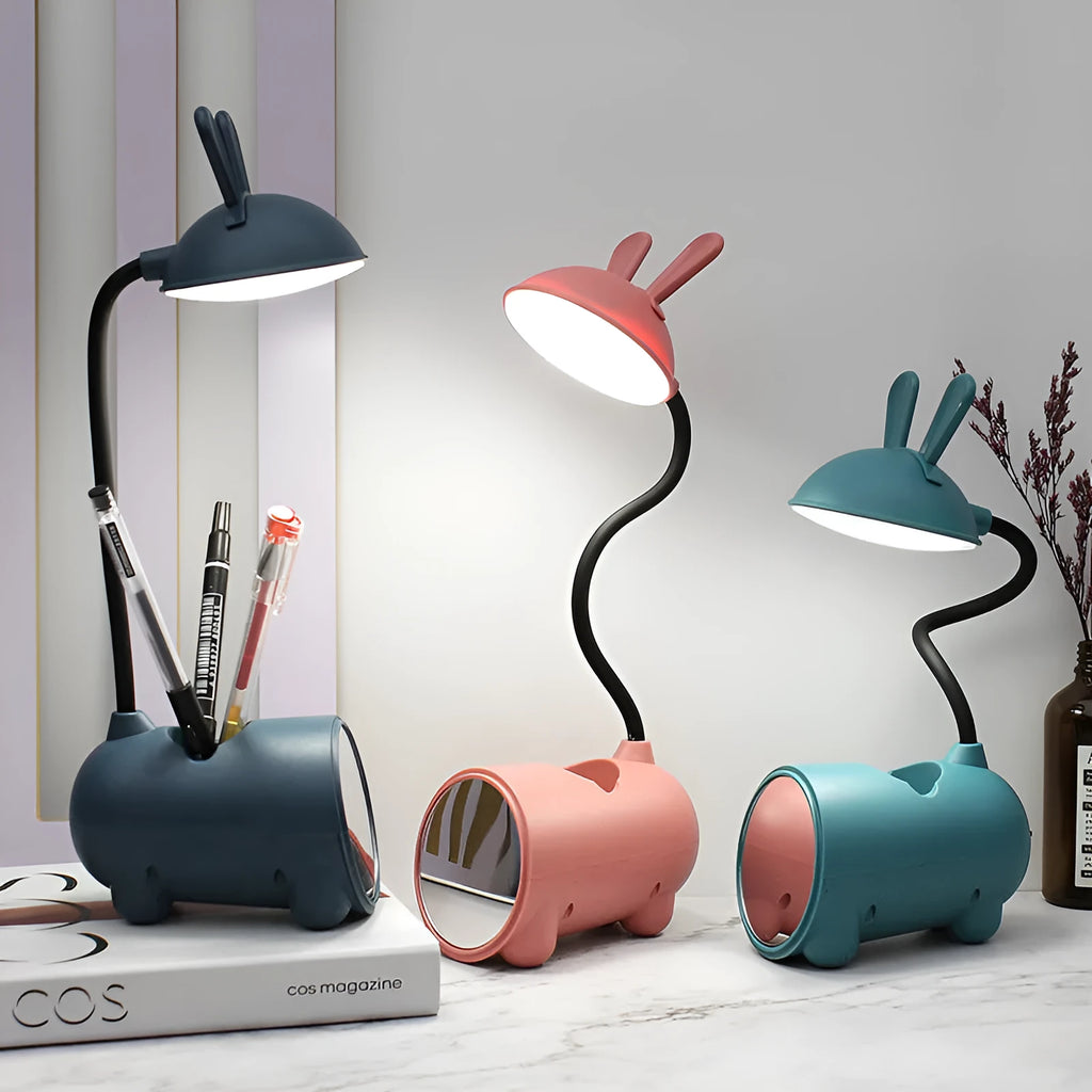 Cartoon-themed desktop table lamp with integrated pen container in green colour
