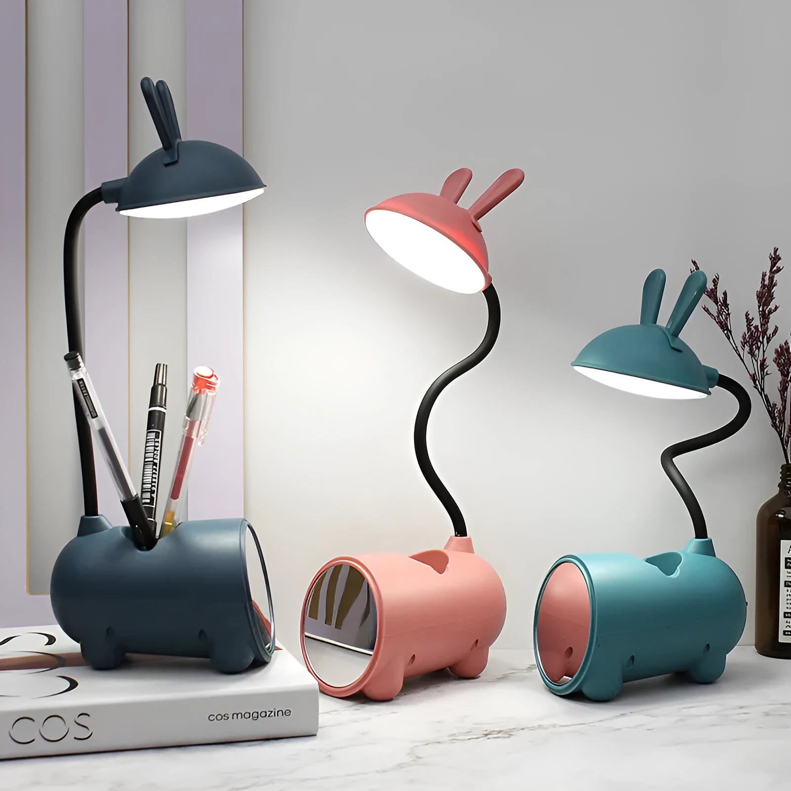 Cartoon-themed desktop table lamp with integrated pen container in green colour