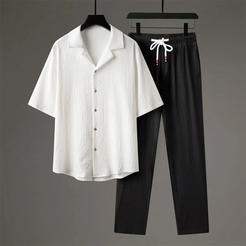 Men's grey Chinese-style casual two-piece sportswear set with short sleeve top and trousers on a hanger.