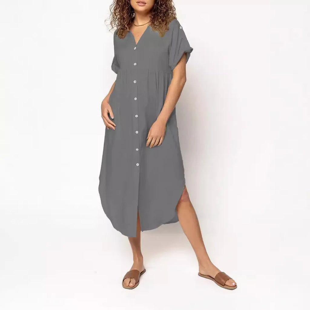 Women's loose fit casual dress with button front and mid-length skirt in solid colour.