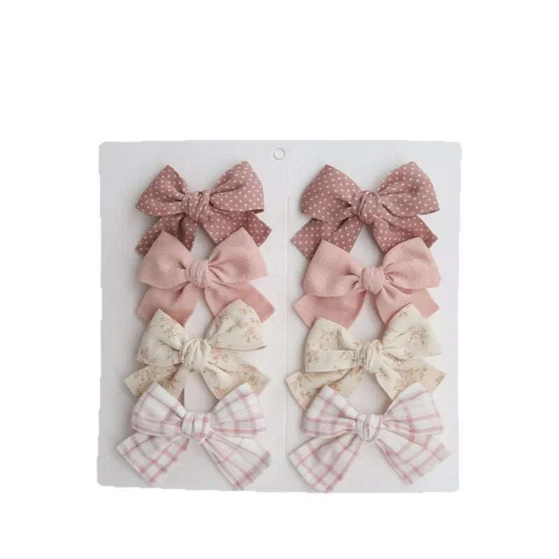 Children's fabric bow hair clips in dovetail shape with eight colour set options