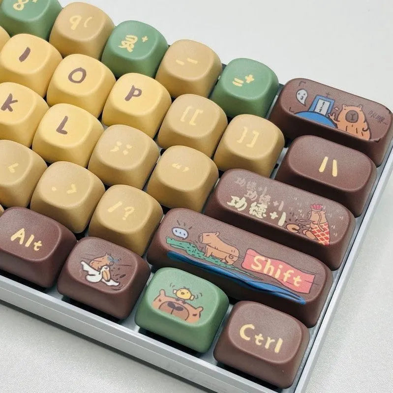 Capabala Girl MOA style 130-piece ABS plastic keycap set for mechanical keyboards, spread out showing alphanumeric and modifier keys.