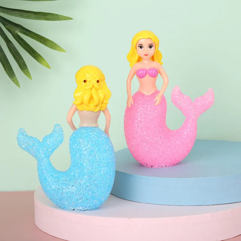 Plastic mermaid LED night light with colourful glow, 15.4cm high, available in white, pink, or blue