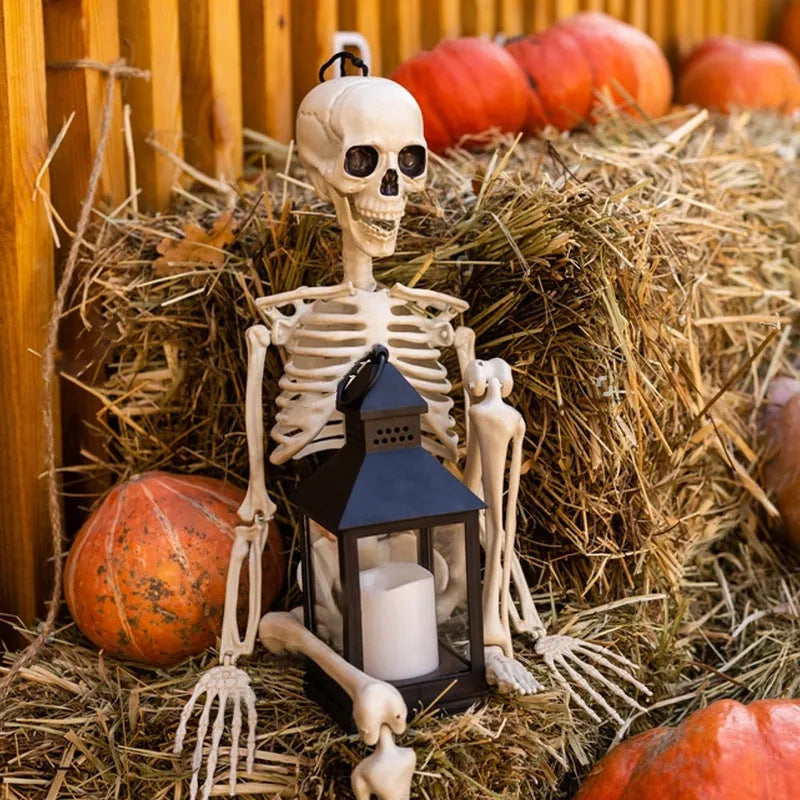 Poseable 90cm tall plastic skeleton Halloween decoration with articulated limbs.