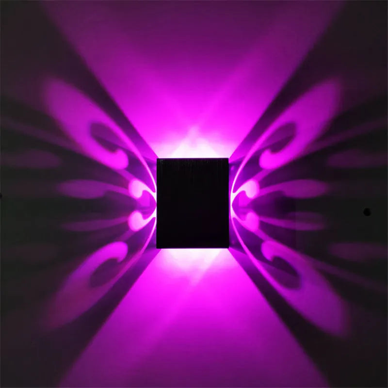 Modern aluminium butterfly-shaped LED wall lamp showing concealed and surface mount options.