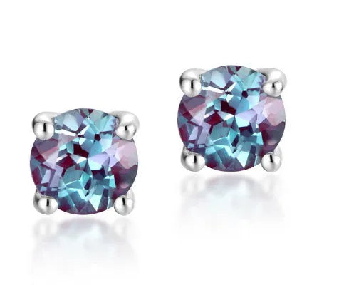 A pair of round geometric stud earrings with a cultivated alexandrite stone set in 925 silver.