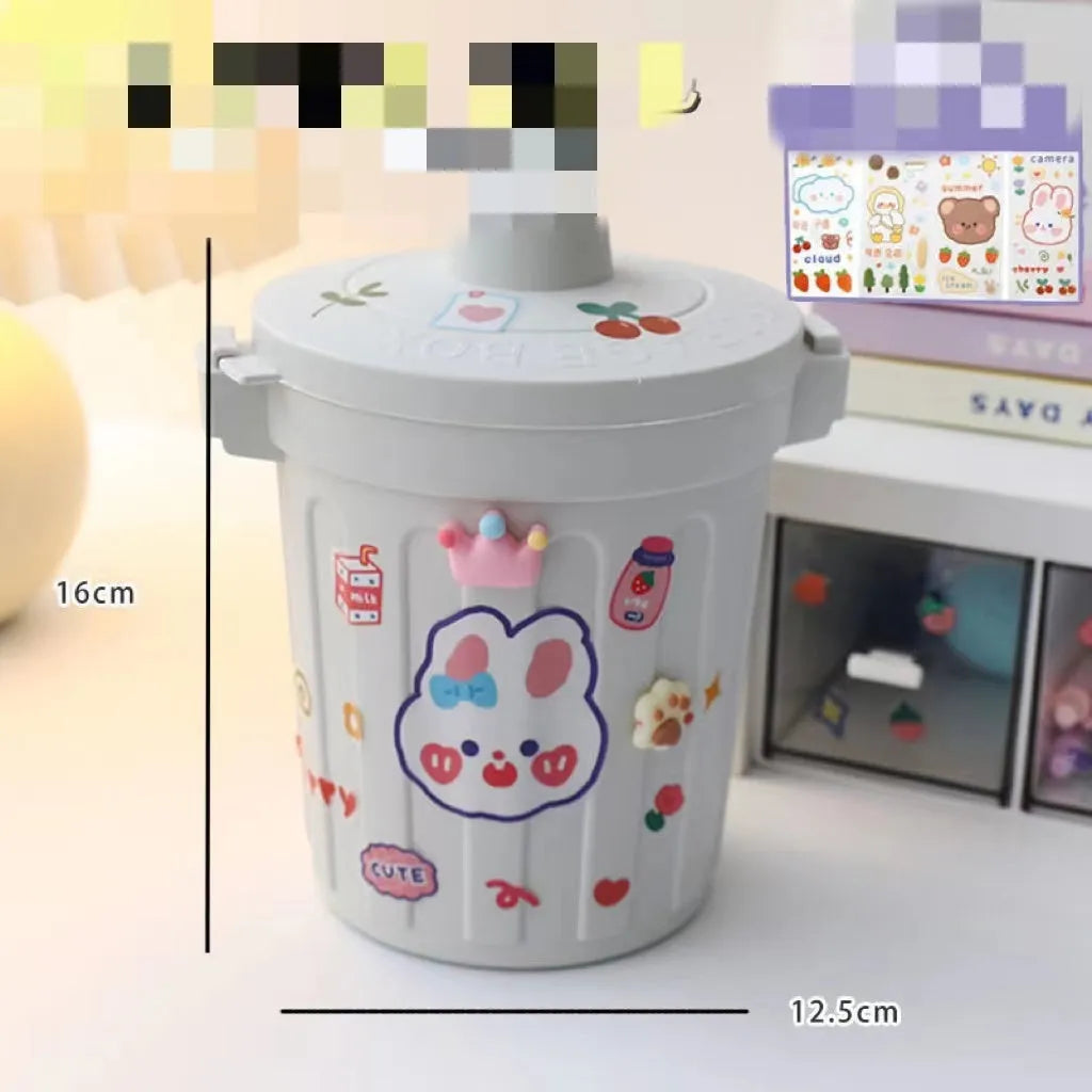 Plastic mini bear shaped desktop trash can with press-type lid in beige gray, includes stickers and garbage bags