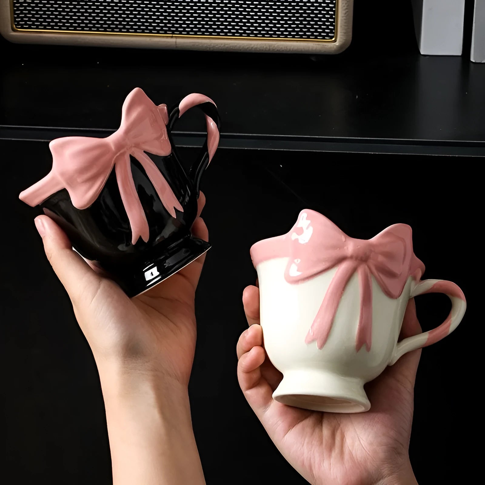 Ceramic mug with a cute girl heart bow design in white powder and black pink colours.