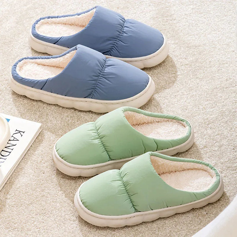 Pair of down cotton slippers with artificial leather upper and thick rubber sole, shown in available colours.
