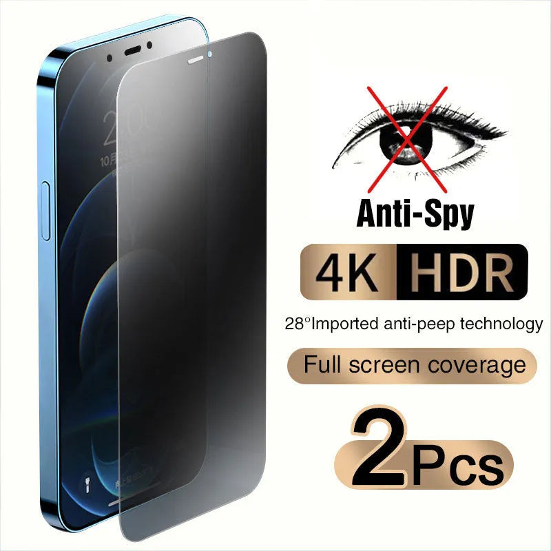 Anti-peeping tempered glass screen protector for iPhone on a table next to a mobile phone.