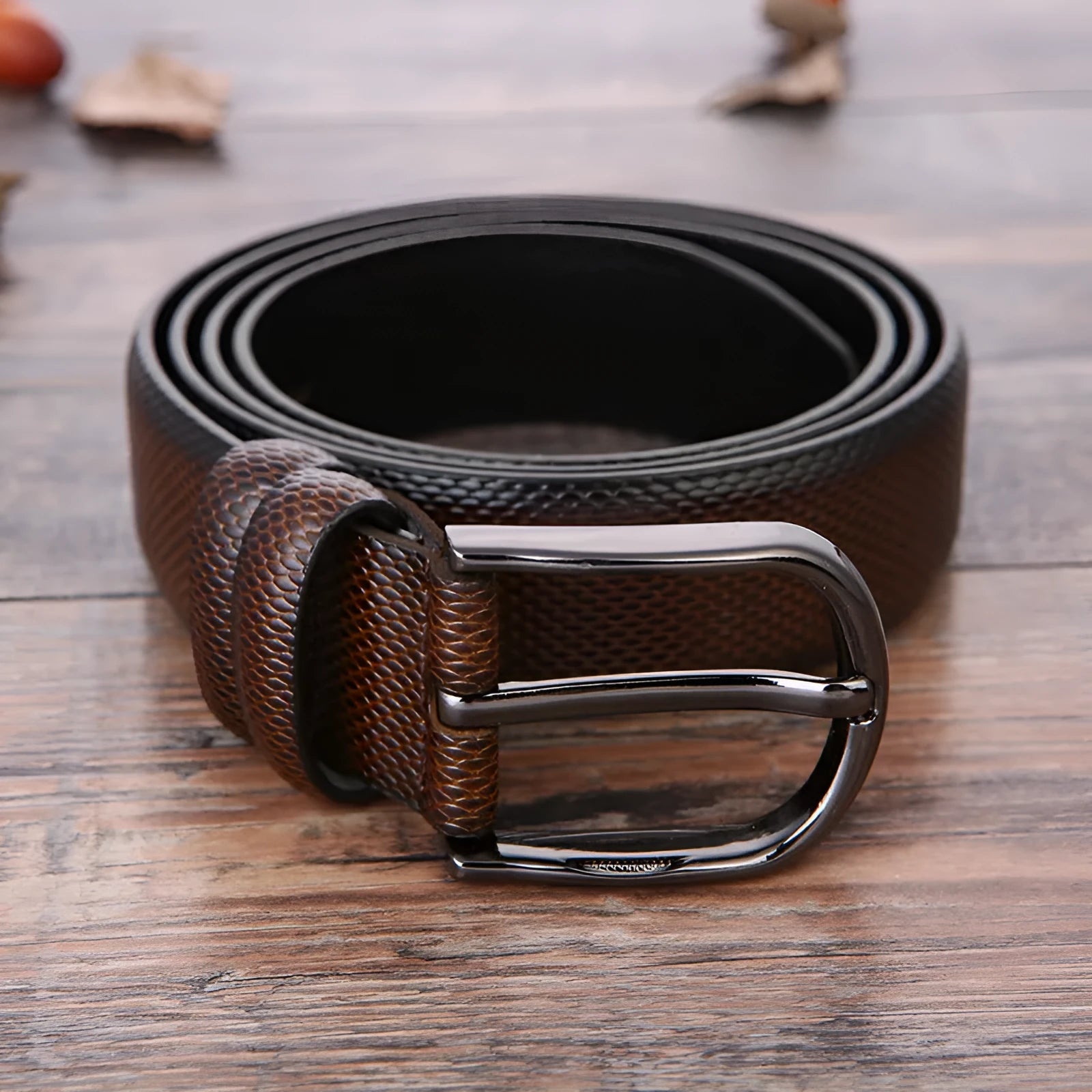 Men's business belt with laser logo detail, alloy pin buckle, and imitation leather strap showing pattern design options