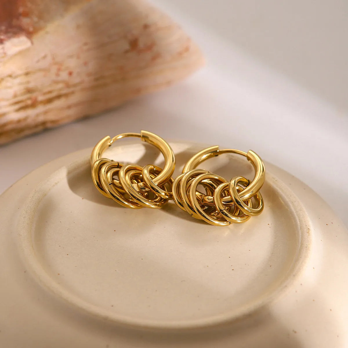 Pair of stainless steel ins style earrings with an electroplated finish in colour option JDE2405019.