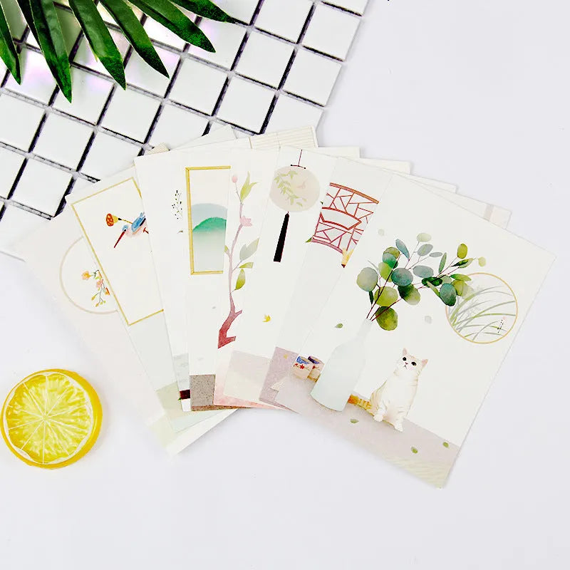 Nine Japanese-style minimalist postcards with cartoon illustrations of retro Paris towers and historic sites