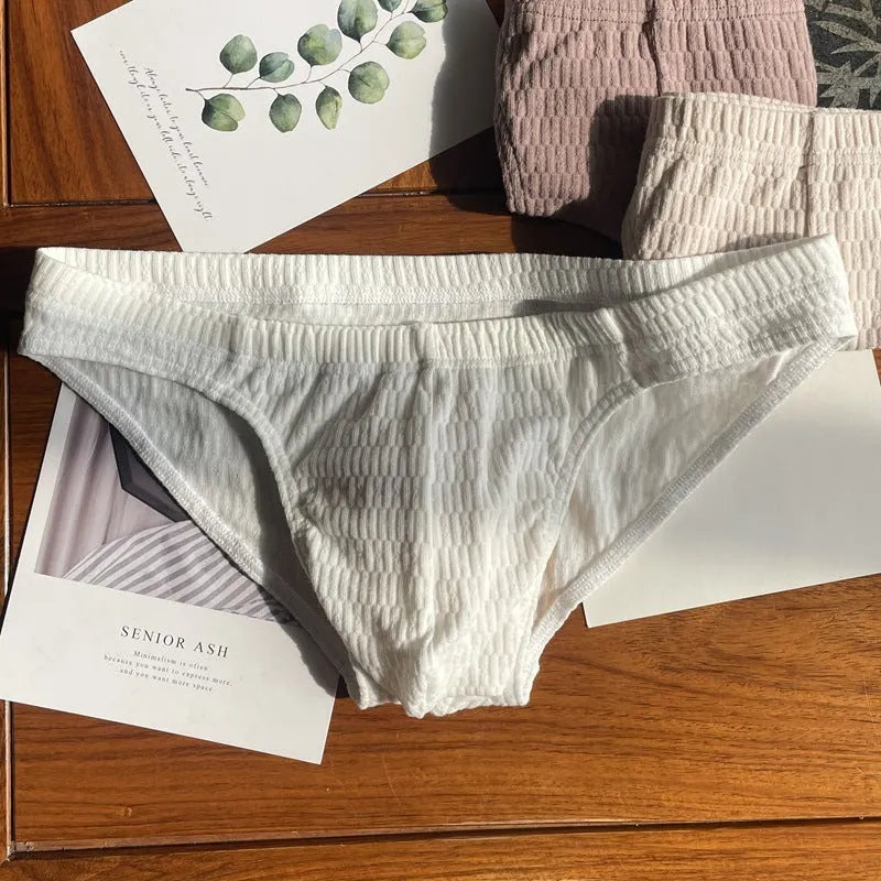 Men's solid colour cotton triangle underwear briefs showing mid waist design and available colour options
