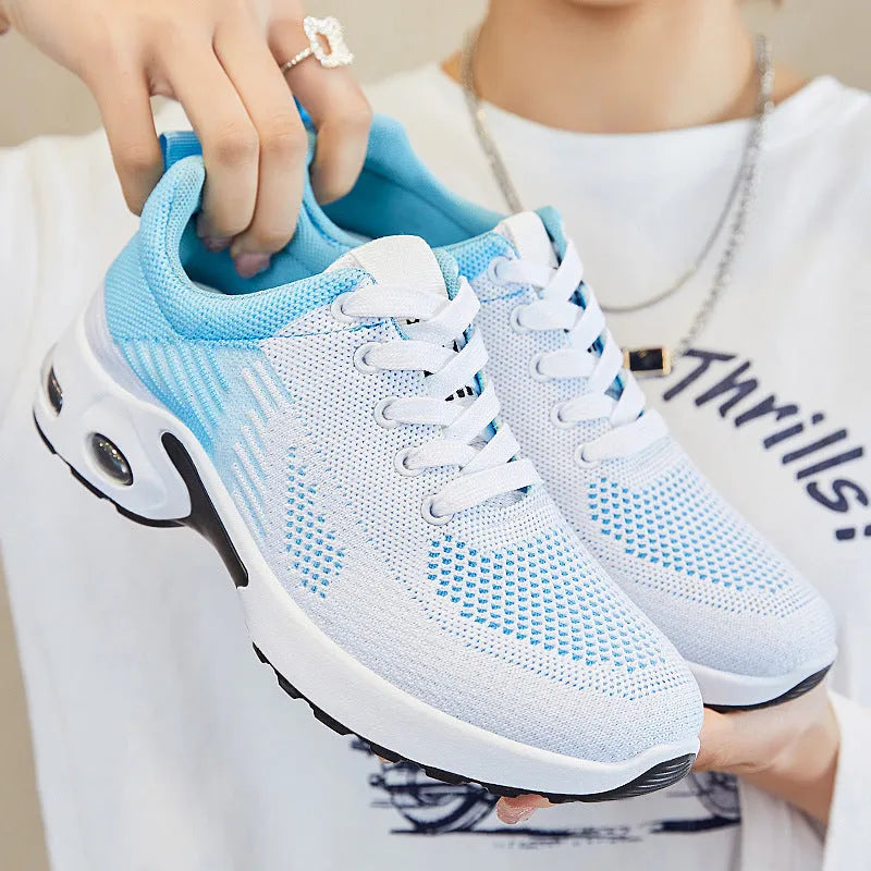 Women's striped flyknit casual running shoes in pink with flat PVC sole and lace-up front