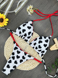 Women's heart print backless swimsuit in briefs style with cotton lining.