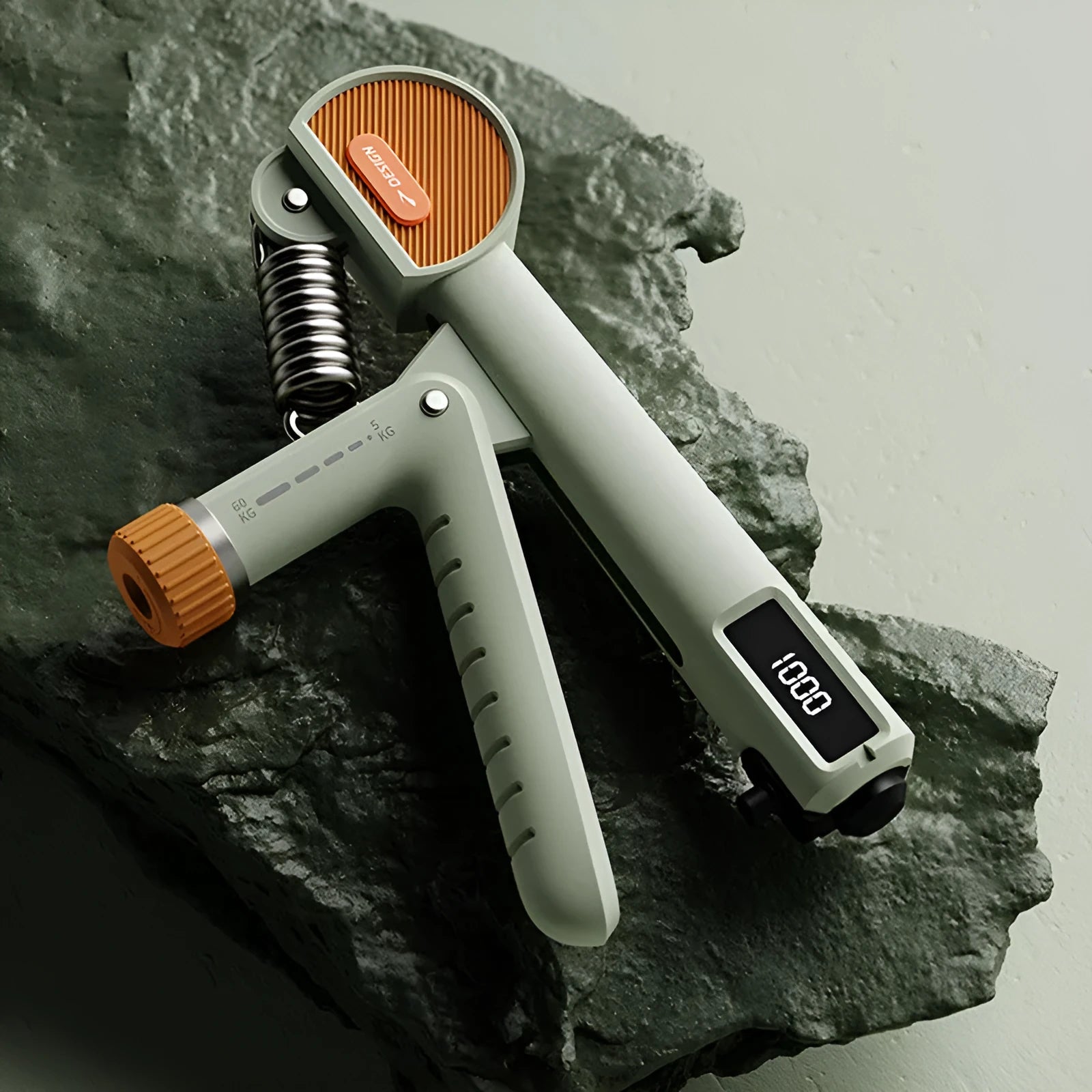 Adjustable spring grip strengthener in ABS plastic with three colour options