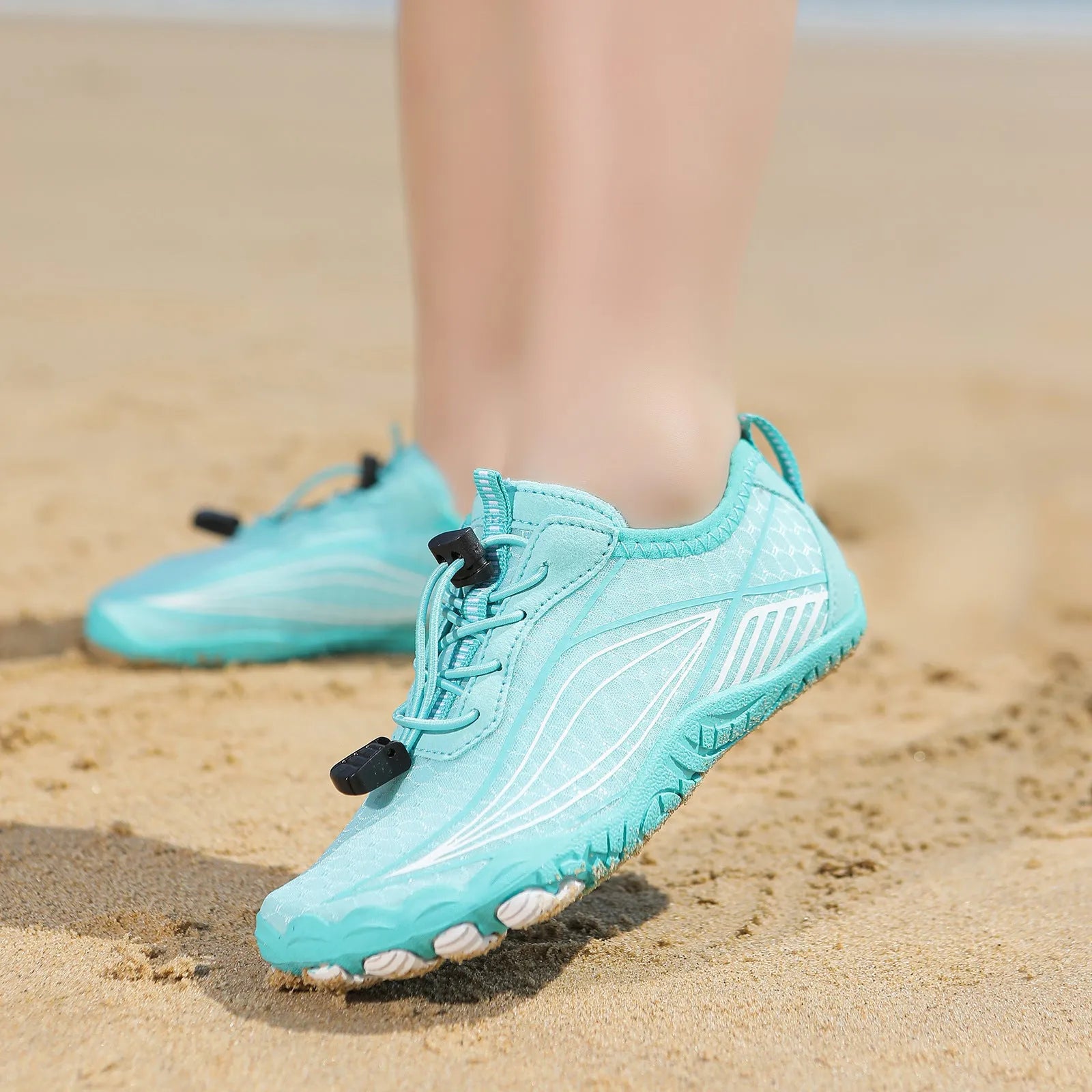 Children's quick-dry wading swimming shoes in grey with a non-slip rubber sole and elastic band.