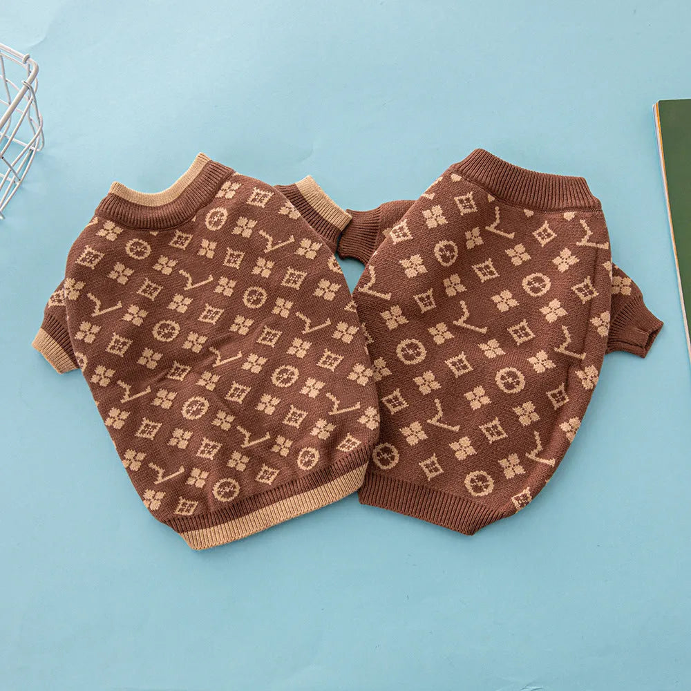 Wool-blend knitted dog sweater in a solid colour on a model dog.