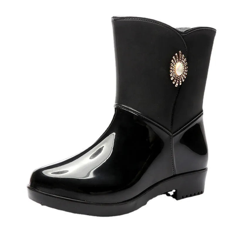 Women's purple PVC rain boots with non-slip sole and middle tube height