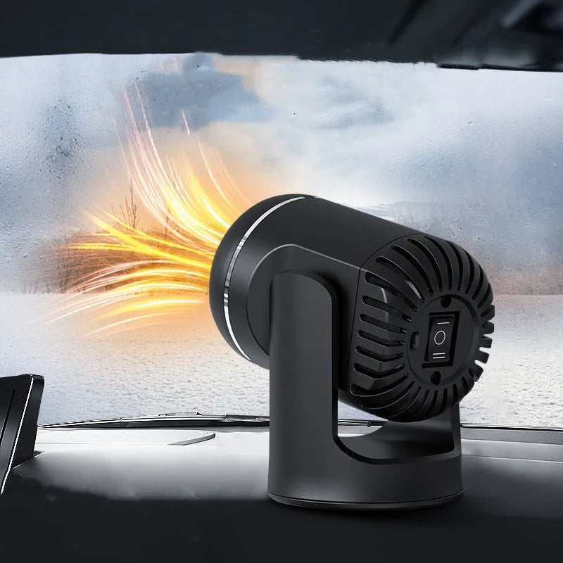Black and white 12V car heater defroster unit with a long power cord on a car dashboard.