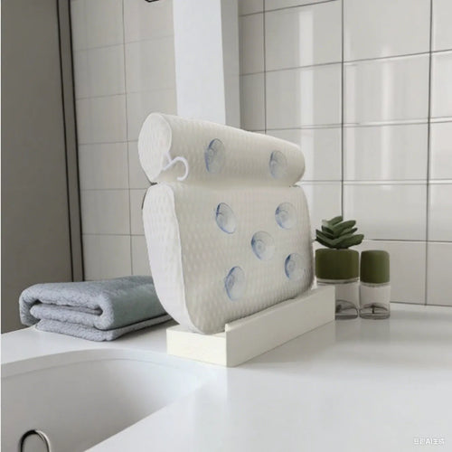 White bathtub pillow with suction cups on a 4D mesh cover.