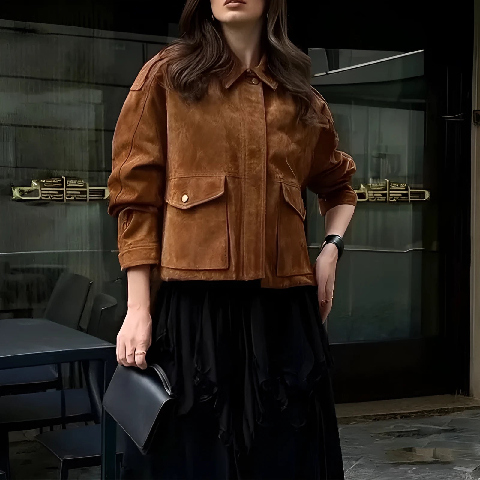 Women's brown suede-style street chic coat with regular sleeves on a hanger.