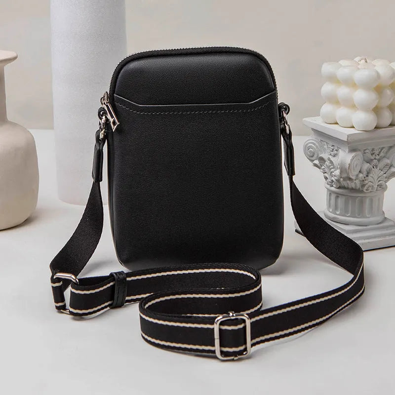Small solid colour crossbody phone bag for women in beige.
