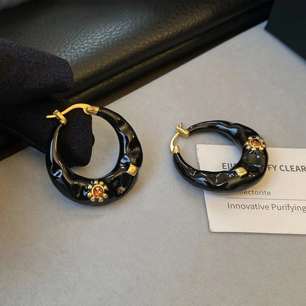Hong Kong style retro ear studs with rhinestone inlay and dripping oil finish in black and red colours