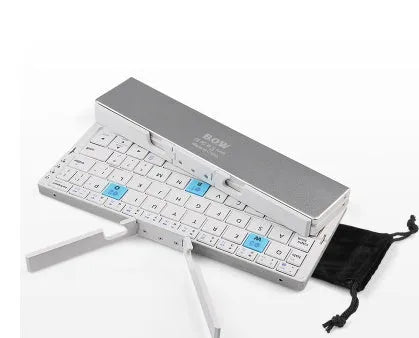 Mini folding Bluetooth keyboard with aluminium alloy backboard, hidden stands, and three-device memory, shown open.