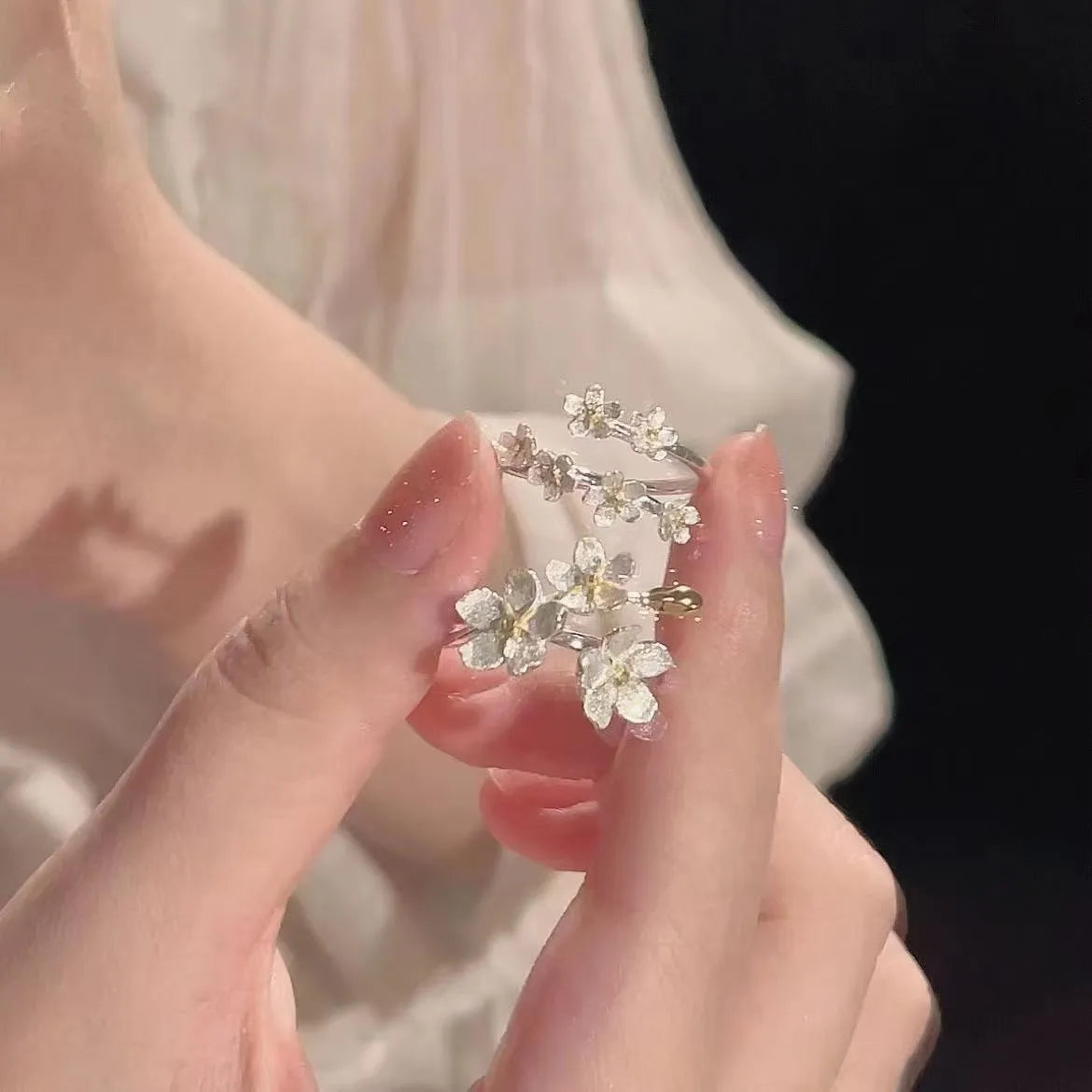 3D Jasmine flower ring with open mouth design in electroplated zinc alloy.