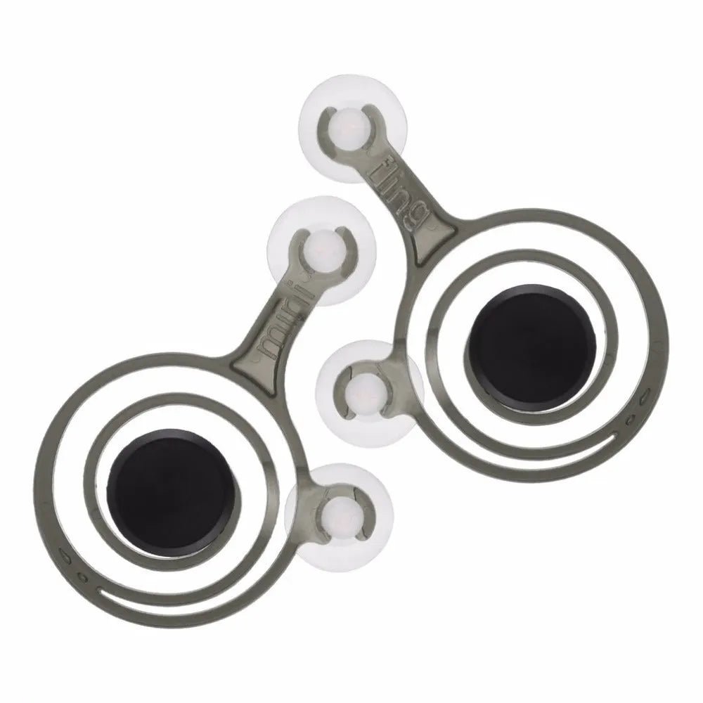 A pair of clear and black universal mini joysticks for mobile phone touch screen gaming.
