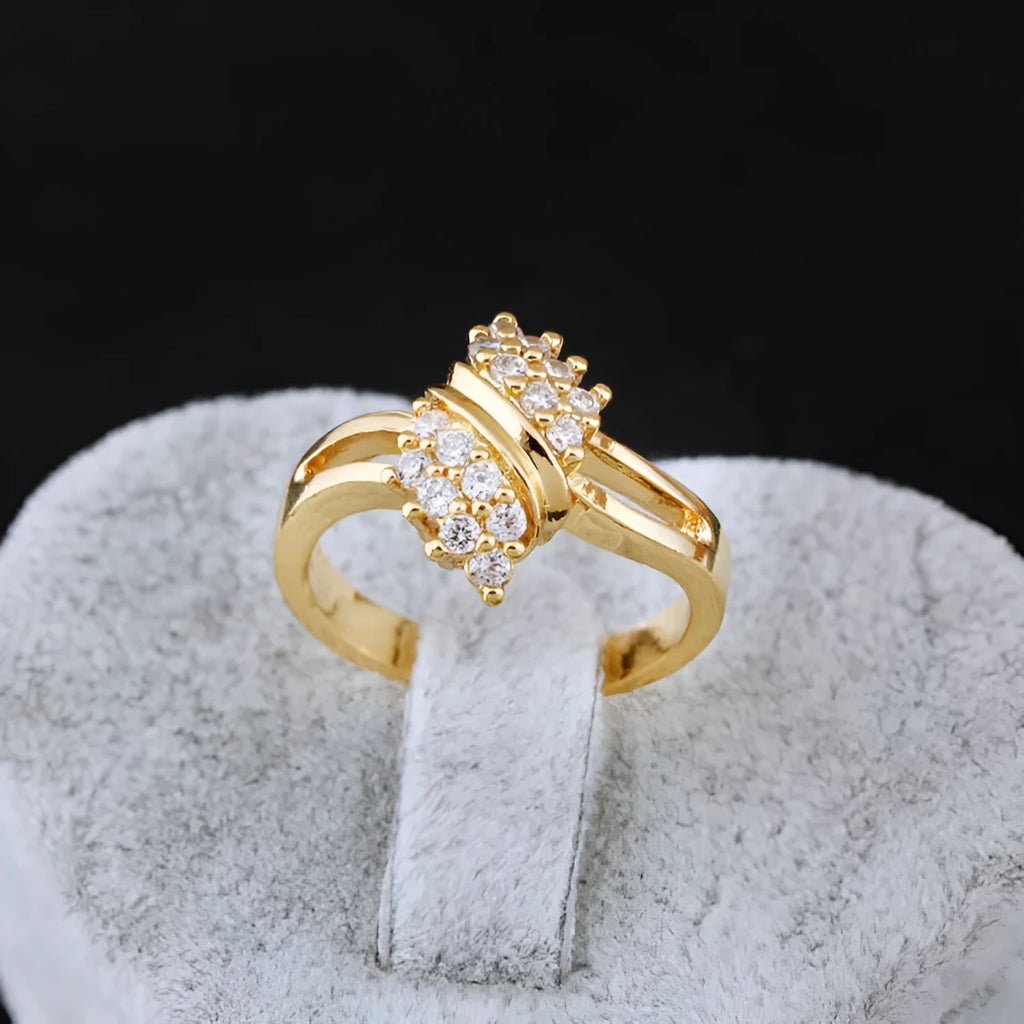 Girls fashion Korean style gold-coloured copper zircon ring on white background