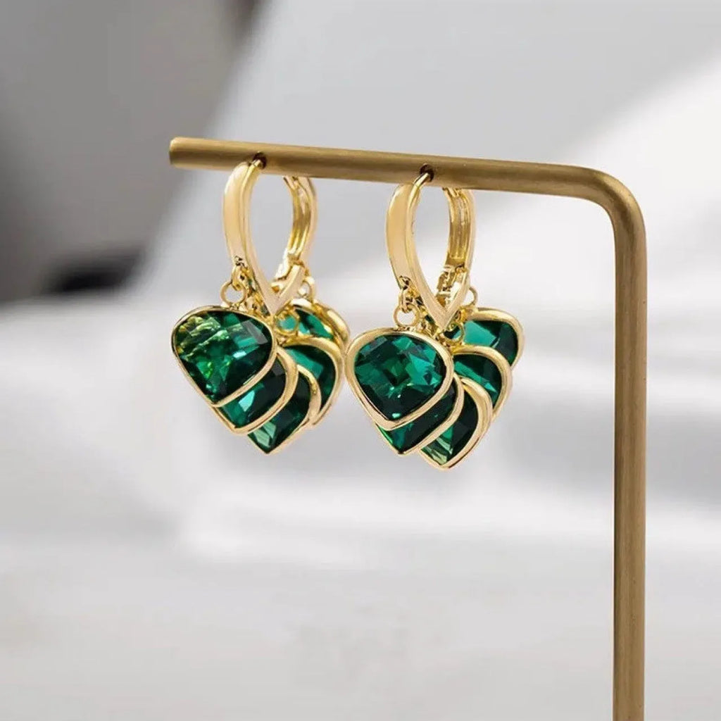 Green heart-shaped glass pendant ear clip earrings with alloy gemstone inlays on copper frame