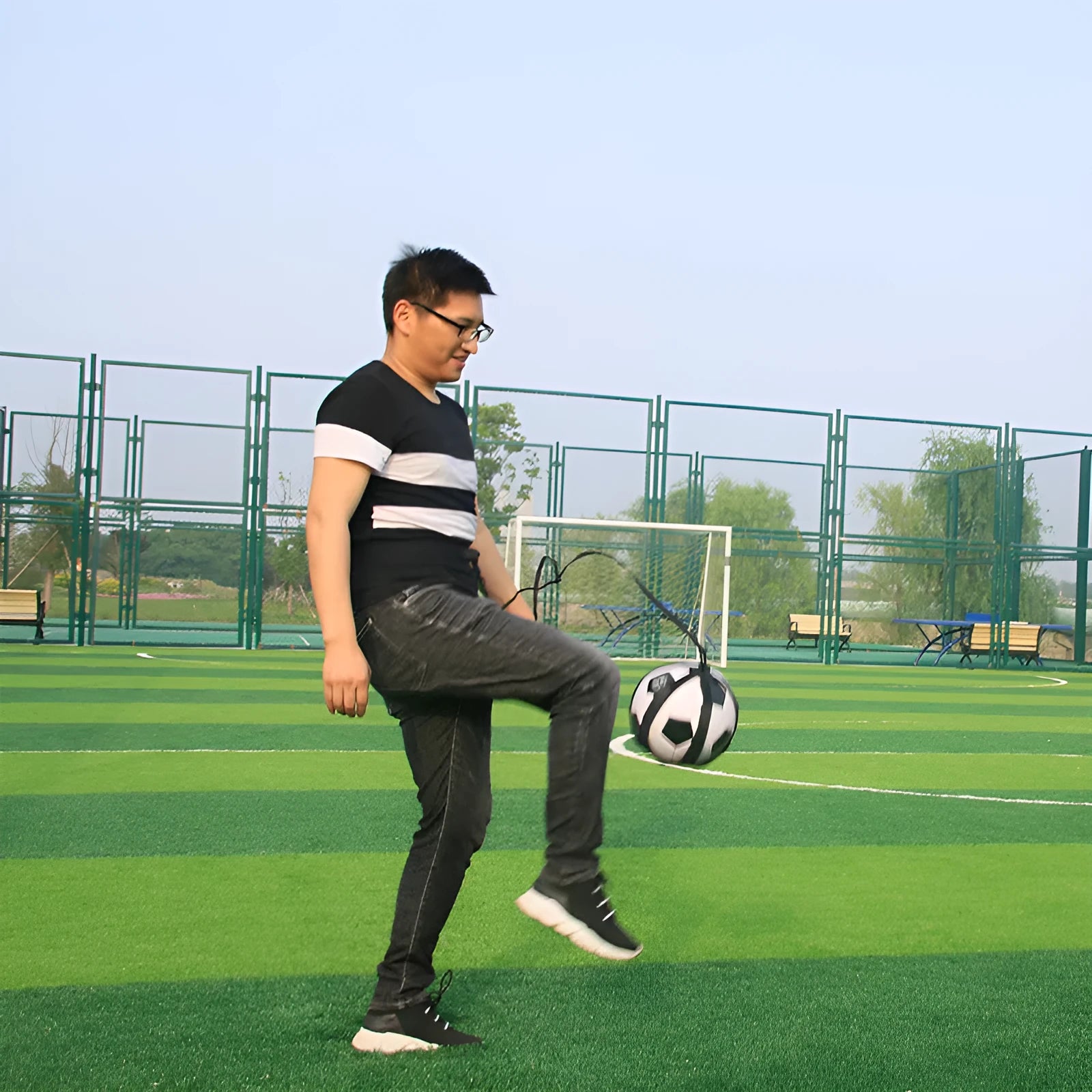 Black football juggling belt with 2 metre cord for solo training exercises