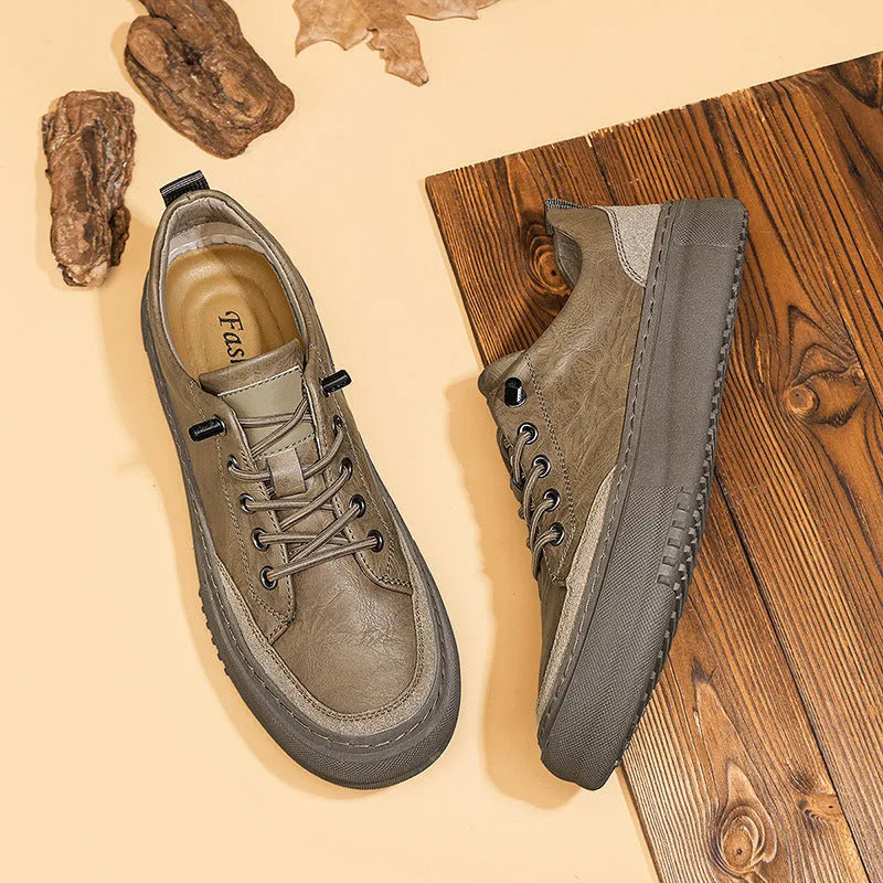 Men's black round toe leather shoes with lace-up front and rubber sole