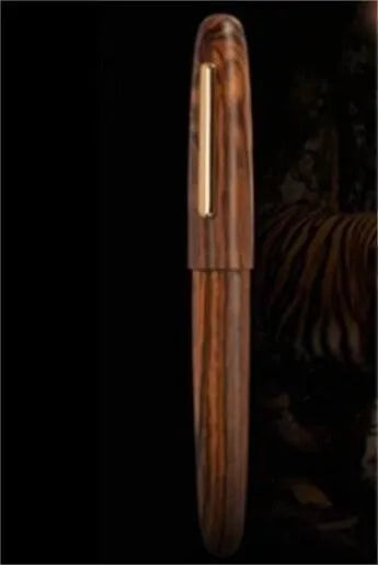 Wooden pen with rotating cap showing seven wood options and four nib types for business writing