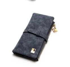TAUREN vertical long wallet in retro matte Pu leather showing zip closure and internal card slots.