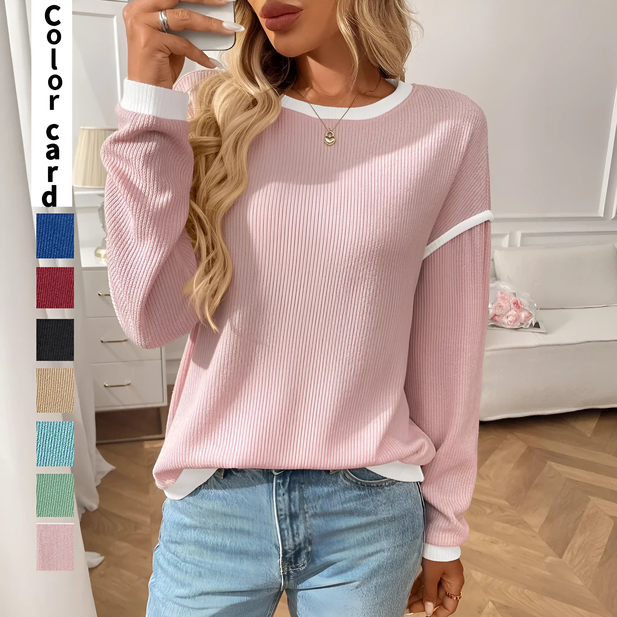 Women's loose pullover top in round neck design with long sleeves available in multiple colours